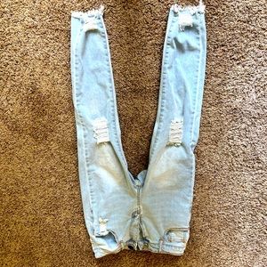 Blue skinny ripped jeans